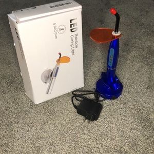 The LED Rainbow Curing Light brand new and well worth the price